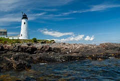 Wood Island Lighthouse on Rocky Shore in Maine